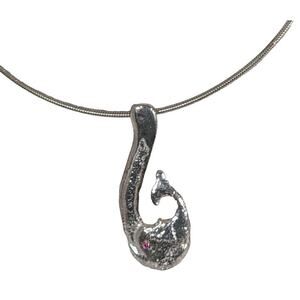 SS Hand cast Maori fish on 17"SP wire Pendant length2.25"Garnet eye.New Zealand